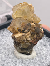 Phenakite on Feldspar with iron staining from Stiepelmann Mine, Klein Spitzkoppe, Erongo Region, Namibia