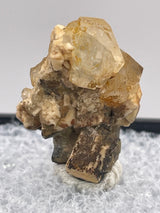 Phenakite on Feldspar with iron staining from Stiepelmann Mine, Klein Spitzkoppe, Erongo Region, Namibia