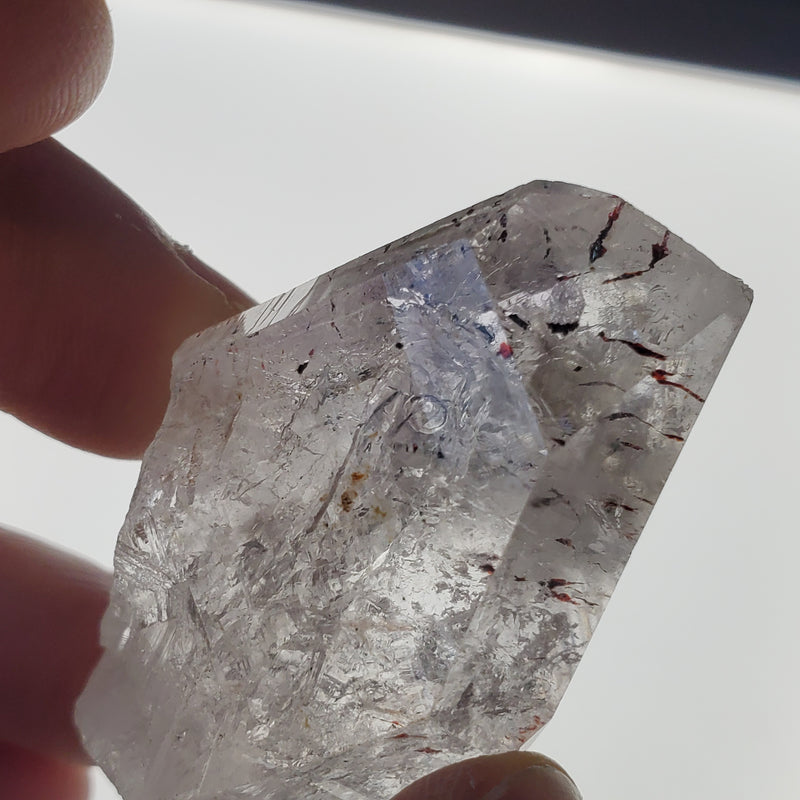 28.14 g Brandberg Quartz With Large Mobile Enhydro and Gorgeous Harlequins From Namibia